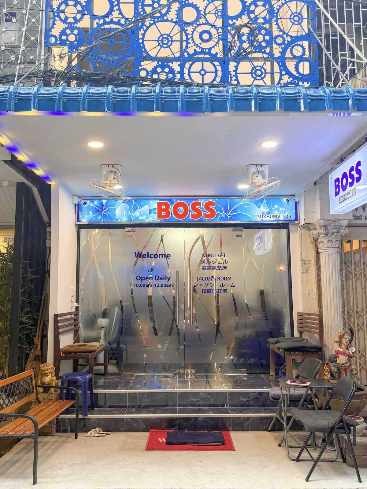 Boss Massage shopfront on Soi Sukhumvit 20, red BOSS sign above a frosted glass door
